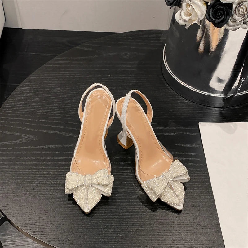 Liyke Fashion Design White Pearl Bowknot Women Pumps Sexy Pointed Toe High Heels Wedding Prom Shoe PVC Transparent Sandal Female